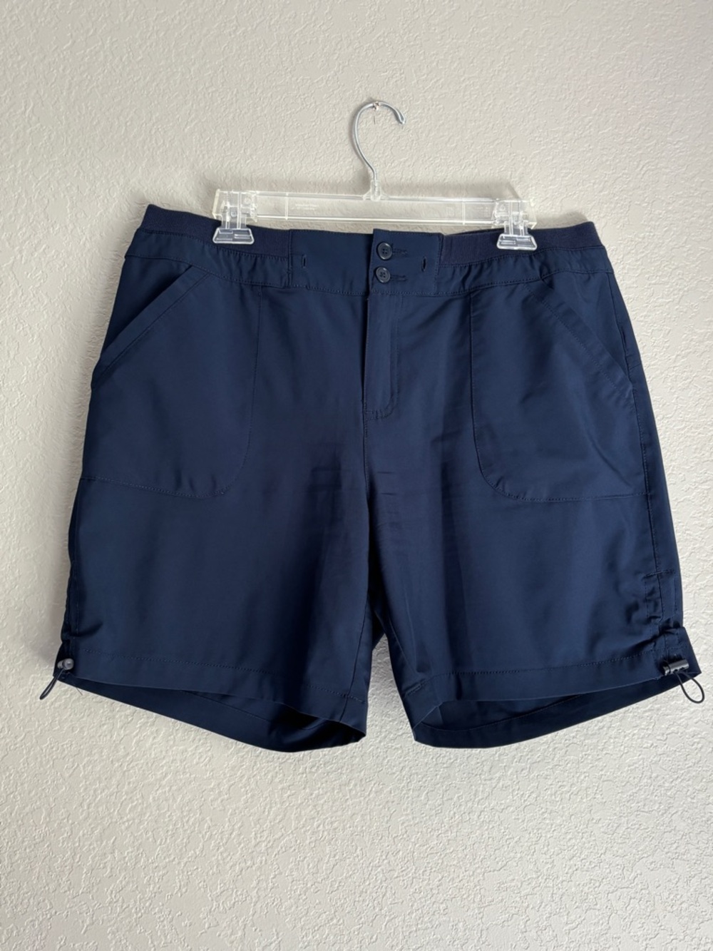 navy blue performance outdoor stretch mid rise 7” inseam women’s shorts 12